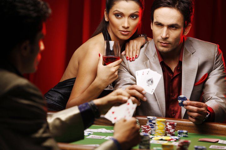pointgo live-dealer studio with multiple HD cameras capturing blackjack, roulette, and baccarat tables